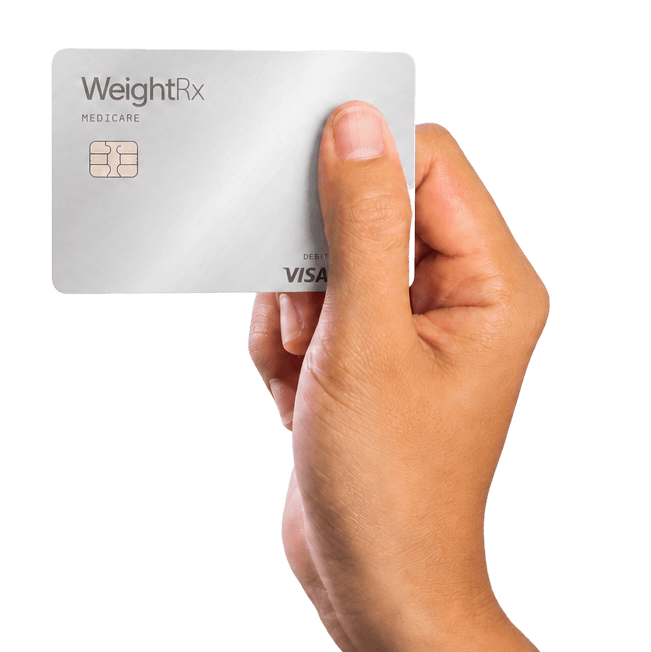 Hand holding a WeightRx Medicare access card