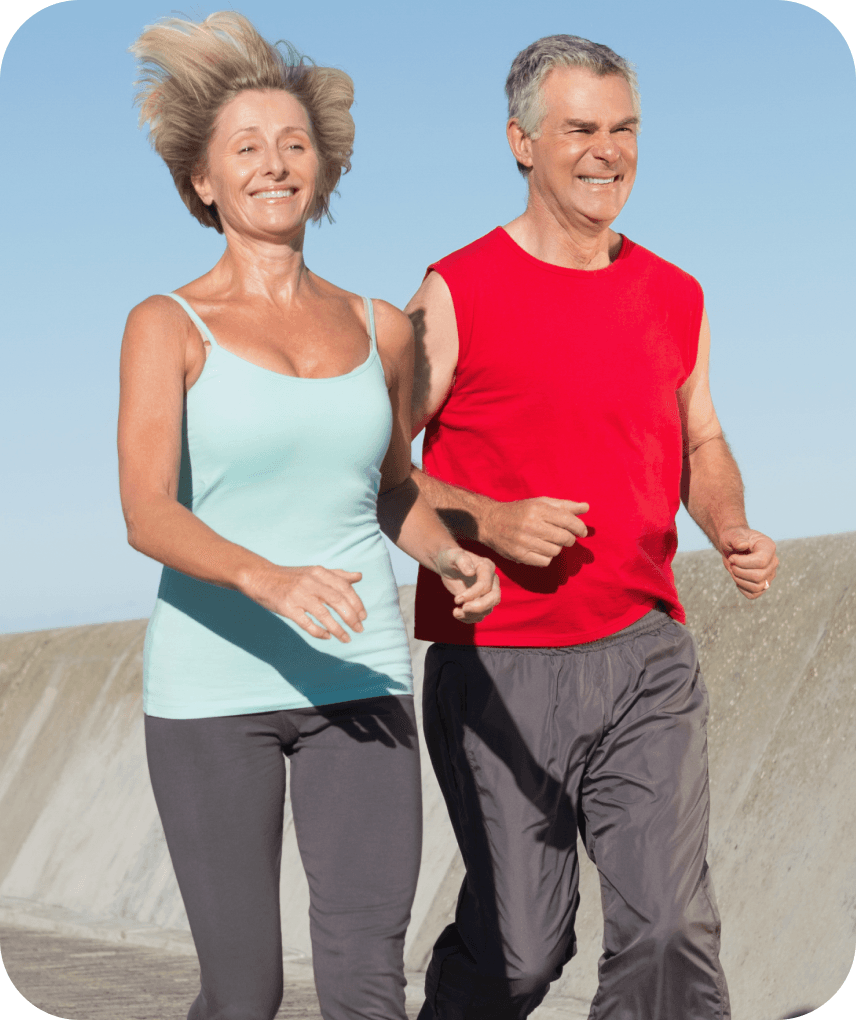 A couple jogging together outdoors